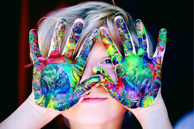 Child with painted hands