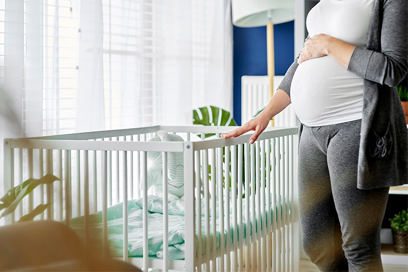 Pregnant Woman in Nursery